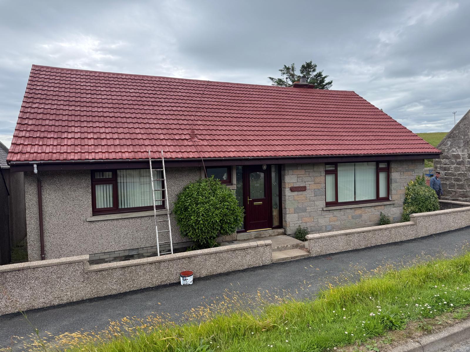 Bungalow after professional roof cleaning and treatment