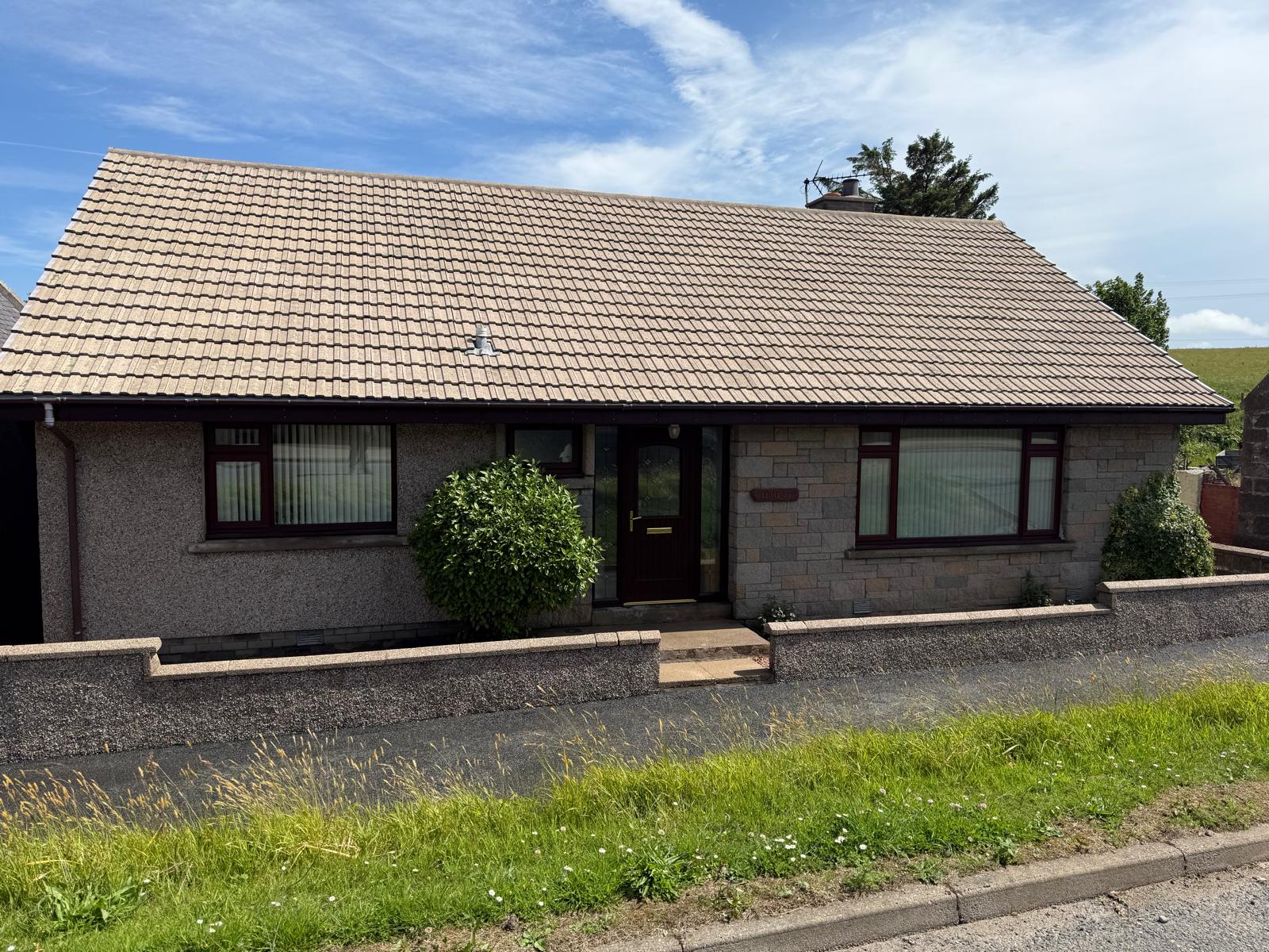 Bungalow with clean tiled roof in Aberdeenshire